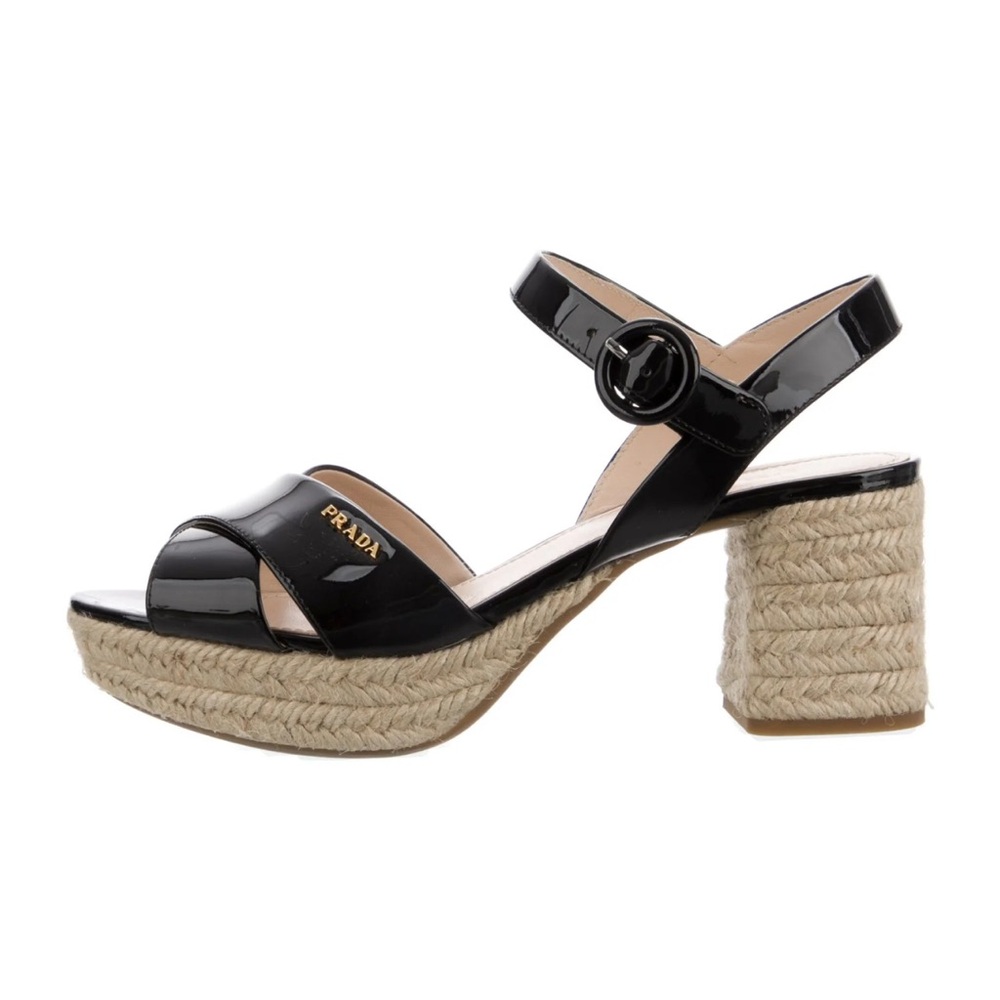 Prada Milano 
Prada black patent leather wedge sandals.